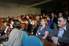 M listening to the Whitcombe Lecture in the lecture hall, including Honorary President Judith Butcher (front left).